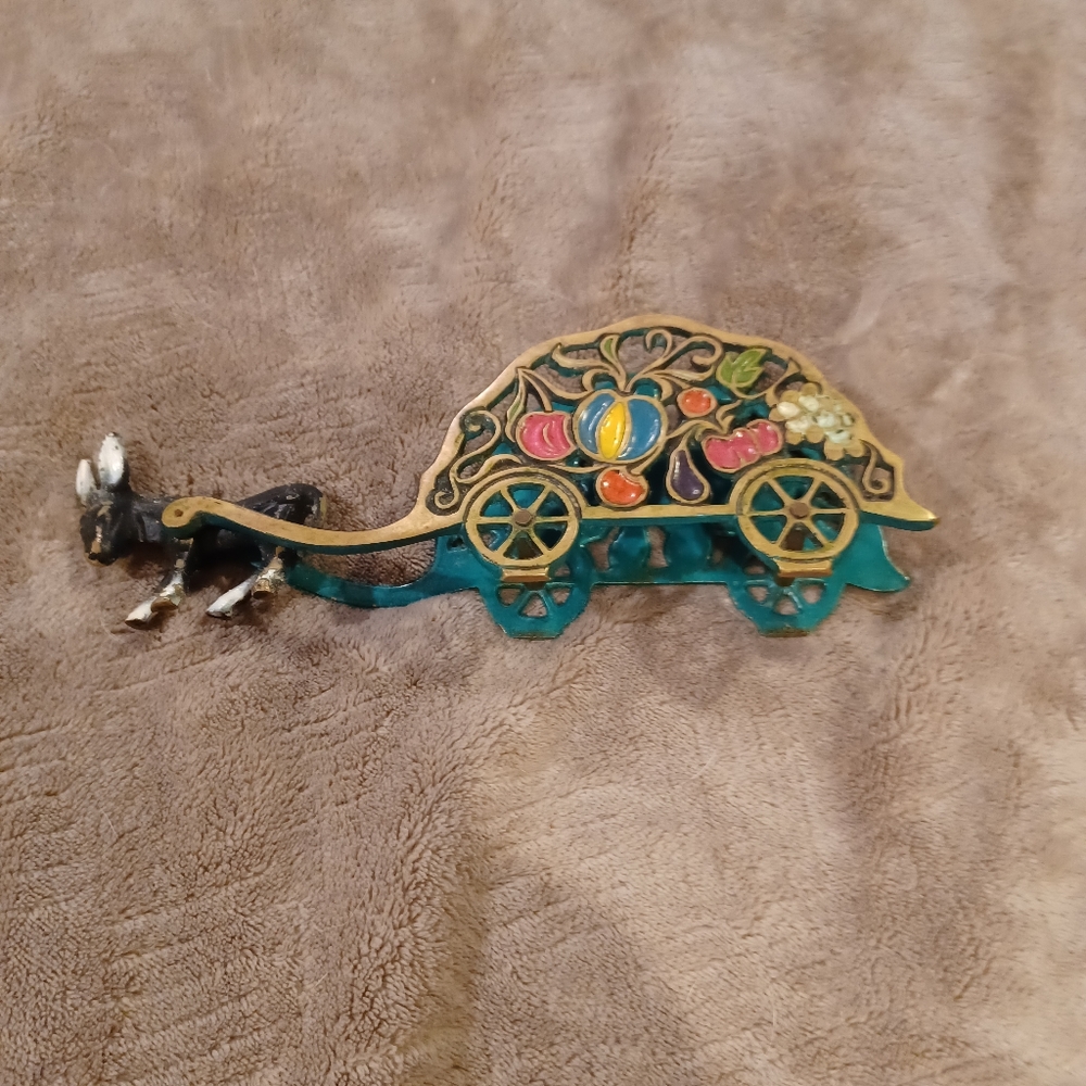 Vintage napkin holder depicting donkey pulling fruit cart